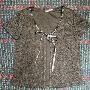 2 layer top with lacy over-layer ribbon tie front.  Tank underneath.